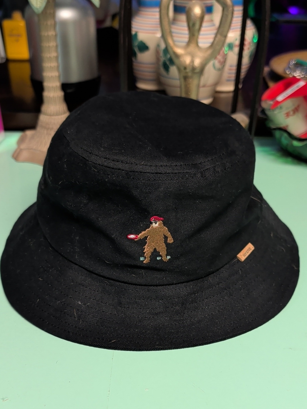 tentree Black Bucket Hat with Embroidered Figure
